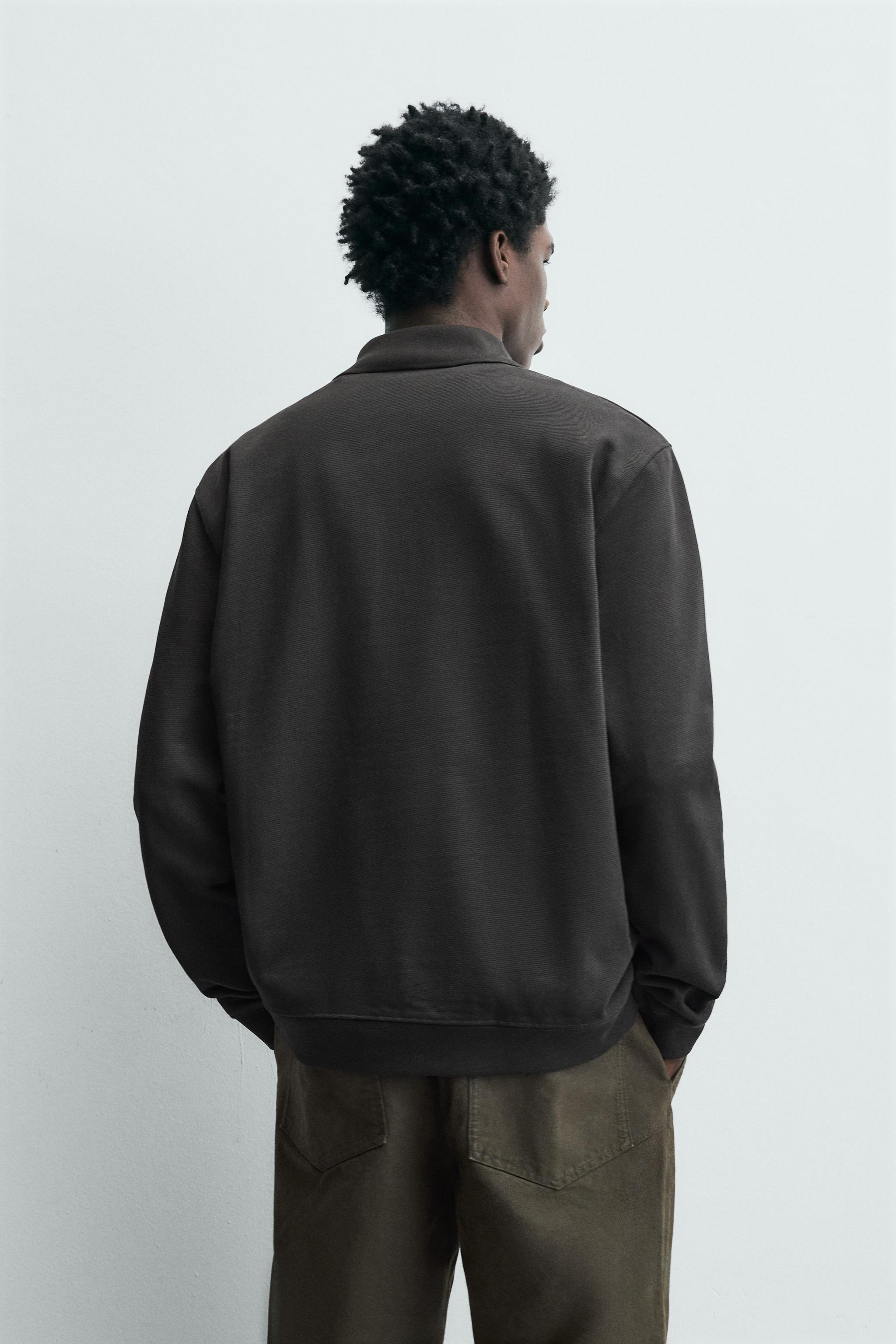 REGULAR FIT TEXTURED POLO SHIRT